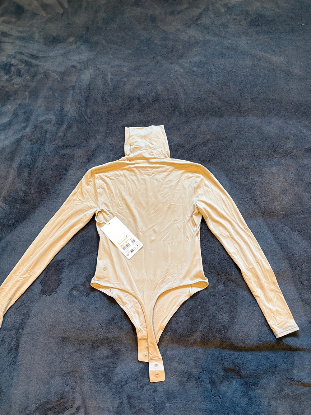 Lululemon Long Sleeve Turtleneck Bodysuit in Beige